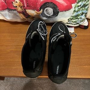 Sorel out n about woman’s boots, size 7.